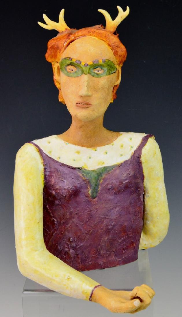 Leslie Rosdol Sculpture: ncludes a signed and dated (Leslie Rosdol, 2000) art pottery Sculpture of a costumed woman. Measures 12"h by 7" Provenance: From a private collector, Elkins Park, PA retiring to Florida