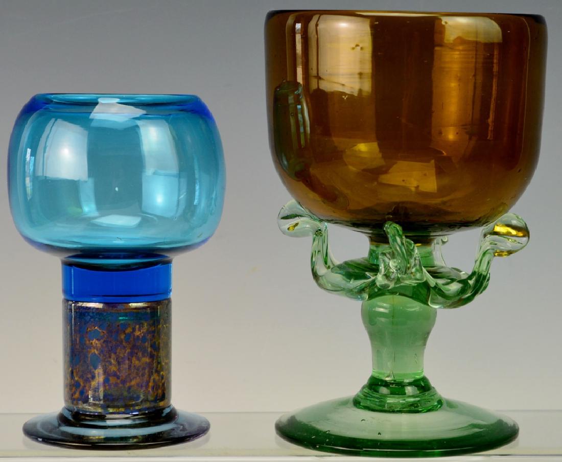 Art Glass Chalice Grouping: Includes (2) Art Glass Chalices: (1) measures approx. 6"h and the other, which has a sculpted base, measures 7.5"h
