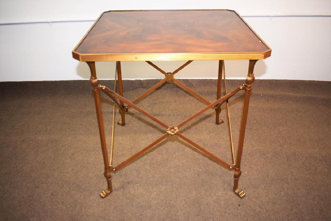 Theodore Alexander Directoire Style Table: Theodore Alexander Directoire Style Table. With metal fittings, paw feet, and book matched veneer top