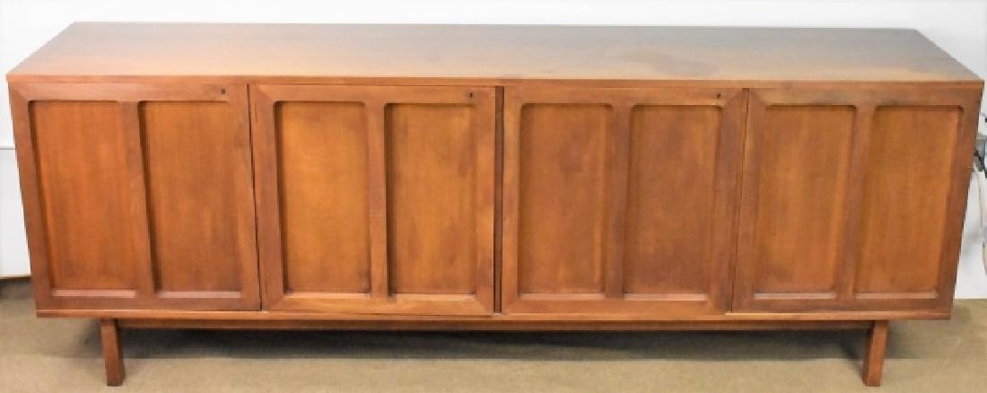 Hans Wegner Johannes Hansen Sideboard: Includes: Hans Wegner Johannes Hansen Sideboard/ credenza, four paneled doors enclosing shelves and graduated dovetailed drawers, resting on four legs, retains all brass original working locks and key