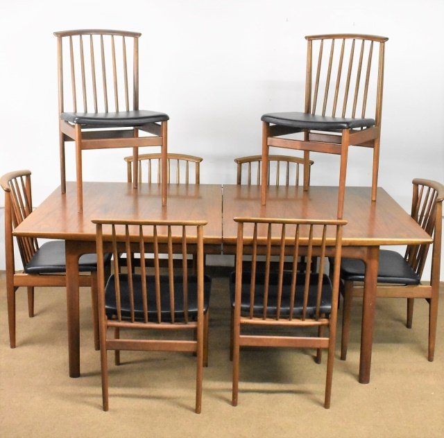 Folke Ohlsson Dux Dining Room Set: A fine 9 piece mid century modern dining room set complete with 3 table leaves to extend table to banquet size consists of 8 matching Folke Ohlsson dining chairs and a (Efraim Ljung) Dux dining table