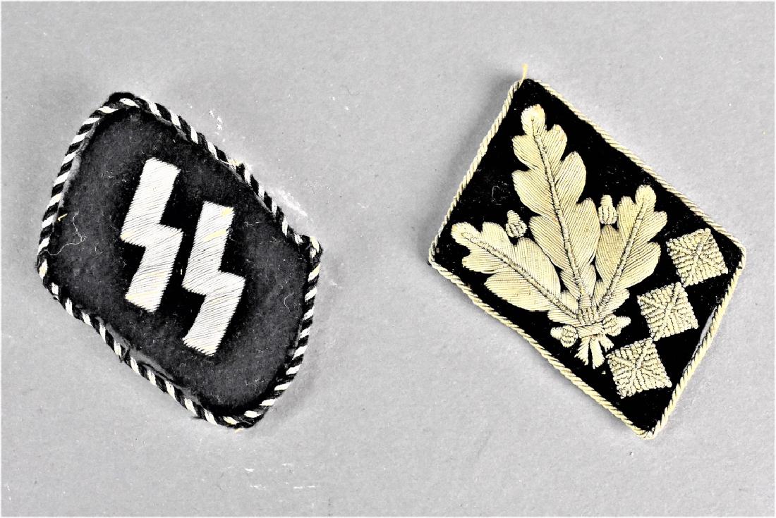 WWII Waffen SS Collar Tabs: Included: (2) Original Tabs of a Waffen SS Officer. The obersgruppenfuhrer (Supreme Group Leader) tab comes with the original factory label still attached with the RZM and the No being 298348 and the