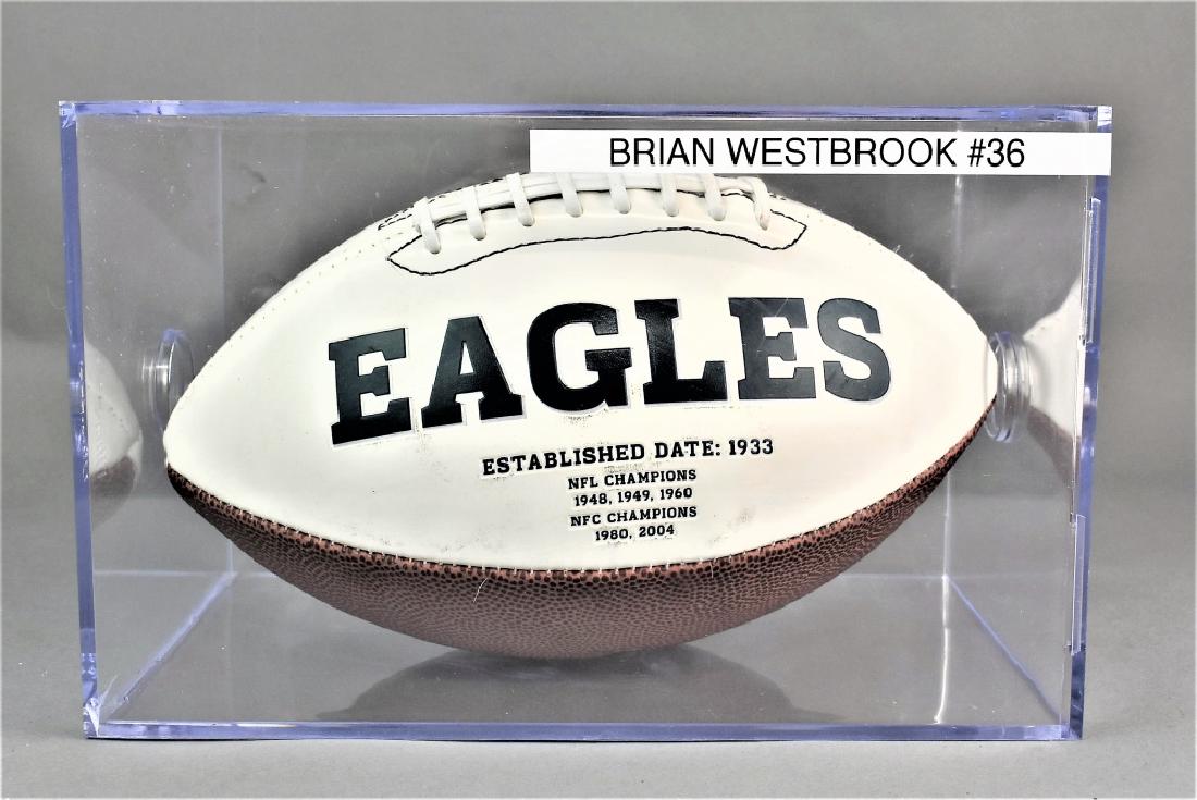 Autographed 2010 Philadelphia Eagles Football: Includes Autographed Eagles Football and is signed by Brian Westbrook #36 and Jamar Adams #45 and is also autographed by Ted Williams and is in a protective case, measuring: 11.25" 7.5" x 7.5" and wei