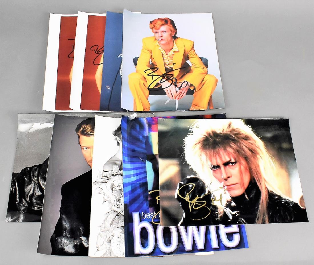 David Bowie Autograph Grouping: Includes: (9) Bowie Photographs, measuring 8" x 10" and have some bends and water loss