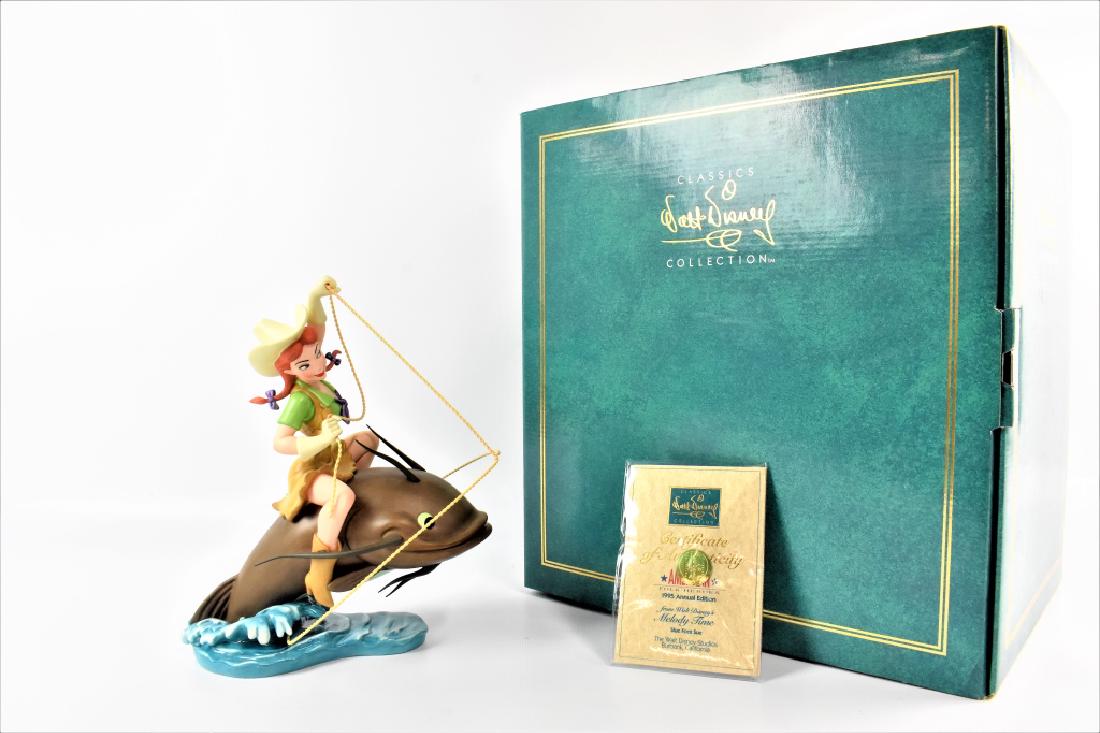 Classic Walt Disney Collection-Melody Time: Walt Disney's Classic Collection figurine. From Melody Time/ American Folk Heroes, titled "Slue Foot Sue" Marked with the Trowel, 1995. Issue 695, Disney number 89185. Size: 9" Includes original box