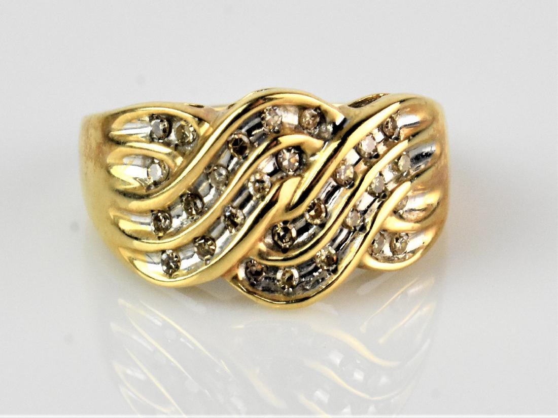 10 kt Yellow Gold and Diamond Ring: 10 kt. Yellow Gold with 28 single diamonds approx 0.15 ct with Diamonds. Ring size 8 1/2.