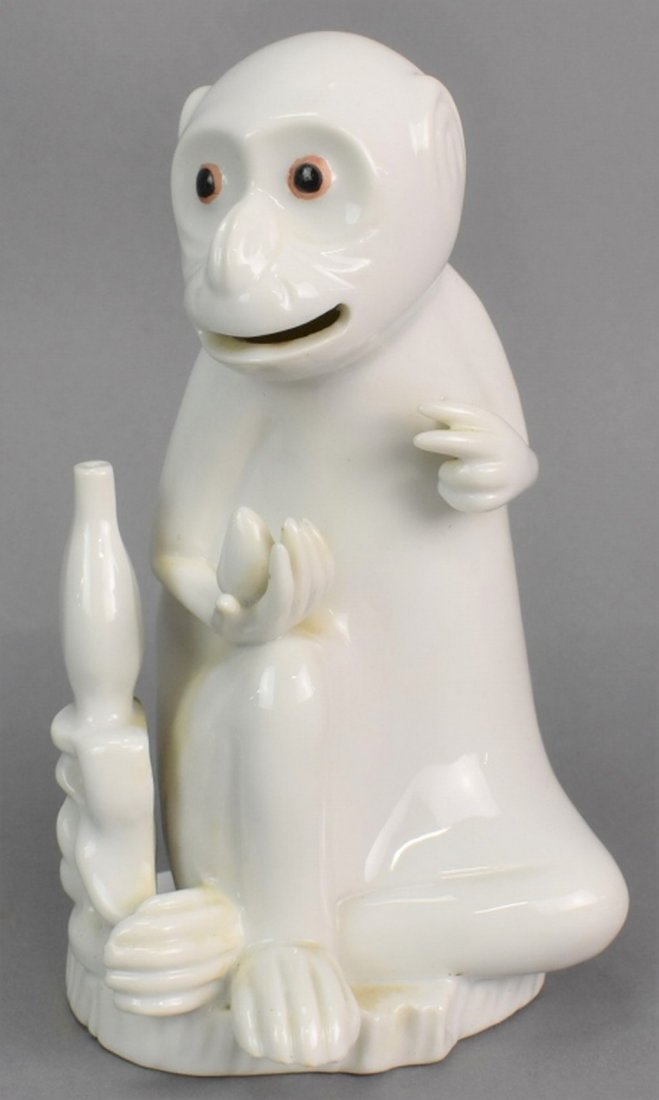 Mottahedeh Porcelain Monkey: A Mottahedeh Porcelain Monkey measuring 3.75" by 6.25" by 3.5" and weighing approx. .64lbs