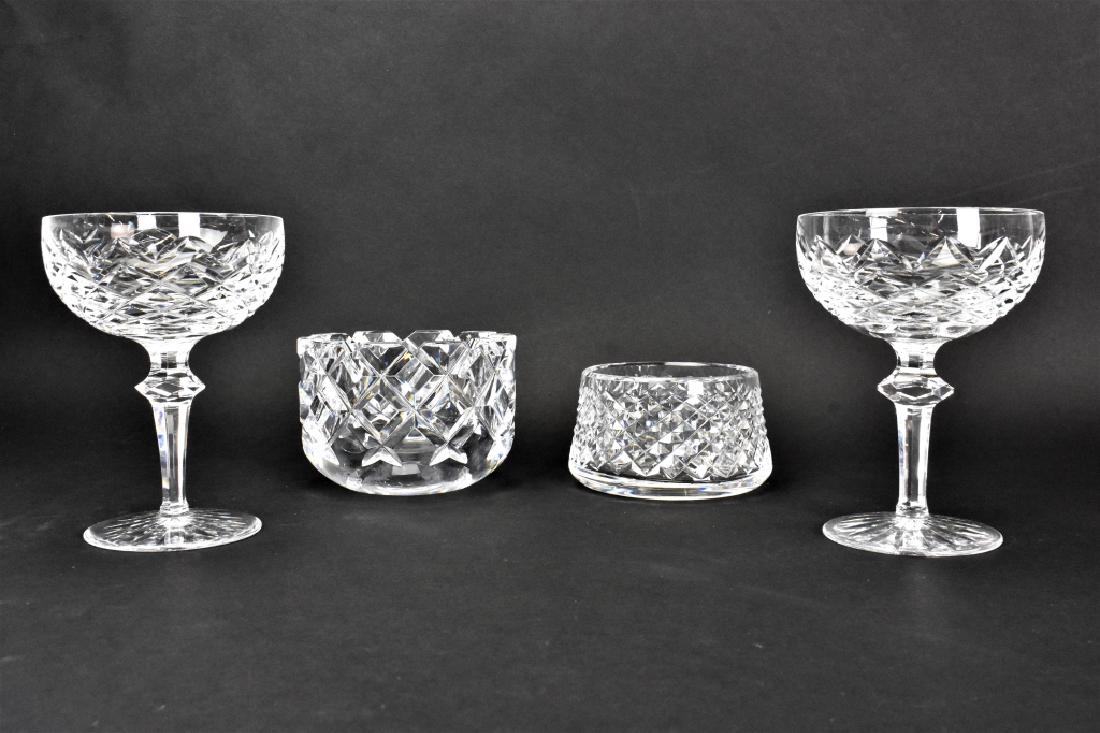 Waterford and Orrefors Art Glass Grouping: Grouping includes (4) pieces; (2) Waterford Crystal Lismore Pattern Champagne/Sherbert Glasses, (1) Orrefors Crystal Glass Candy Bowl, and (1) Waterford Crystal Glass Candy Bowl. ******