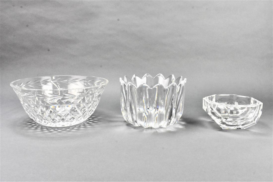 Waterford and Orrefors Crystal Bowl Grouping: Grouping includes (2) signed Art Glass Bowls; a Waterford Crystal Art Glass Bowl measuring approx. ***** and an Orrefors Crystal Art Glass Bowl measuring approx. ***** Also includes an unsigned glass 