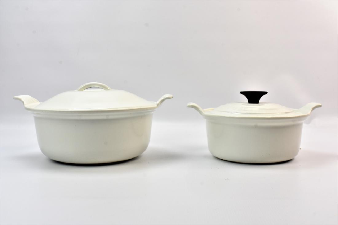 Le Creuset #18 and #22 Round Dutch Oven: A White Enamel Le Creuset #18 and #22 Round Dutch Oven.