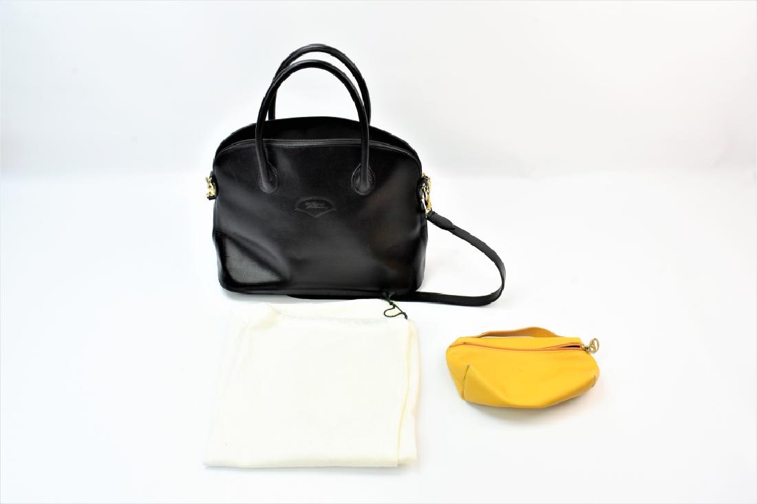 Longchamp Purse Grouping: Grouping includes (2) Longchamp bags. A Black Longchamp Double Handle Purse with Dust Bag and A yellow Longchamp Clutch purse.