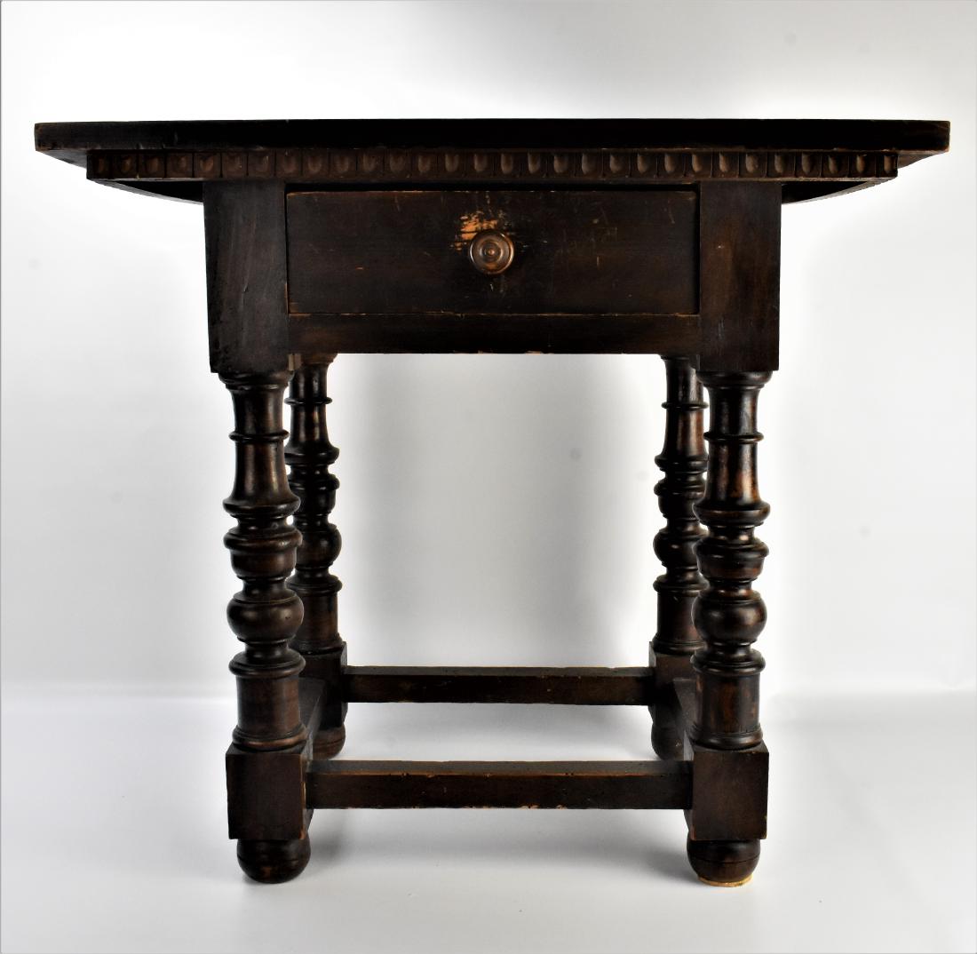 Jacobean or Renaissance Style Table: A Jacobean or Renaissance Styled Table, one drawer resting on turned legs with stretcher base. Two board top with separation. Walnut construction. Early to middle 19th century. Two piece top with sepa