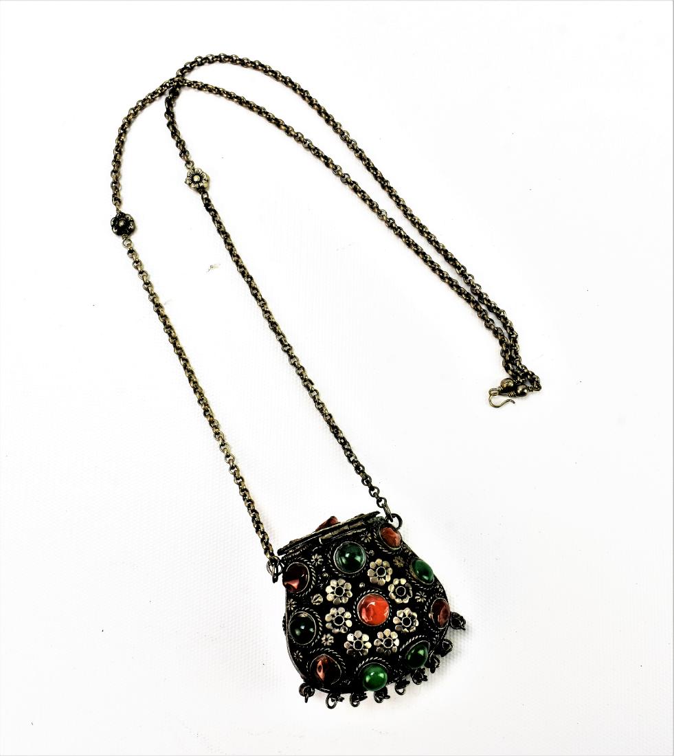 Islamic Middle Eastern Silver Amulet Pouch: Silver content unknown. Decorated on both sides with cabochons and ornate flowers. Typically used for Muslim prayers and valuables.