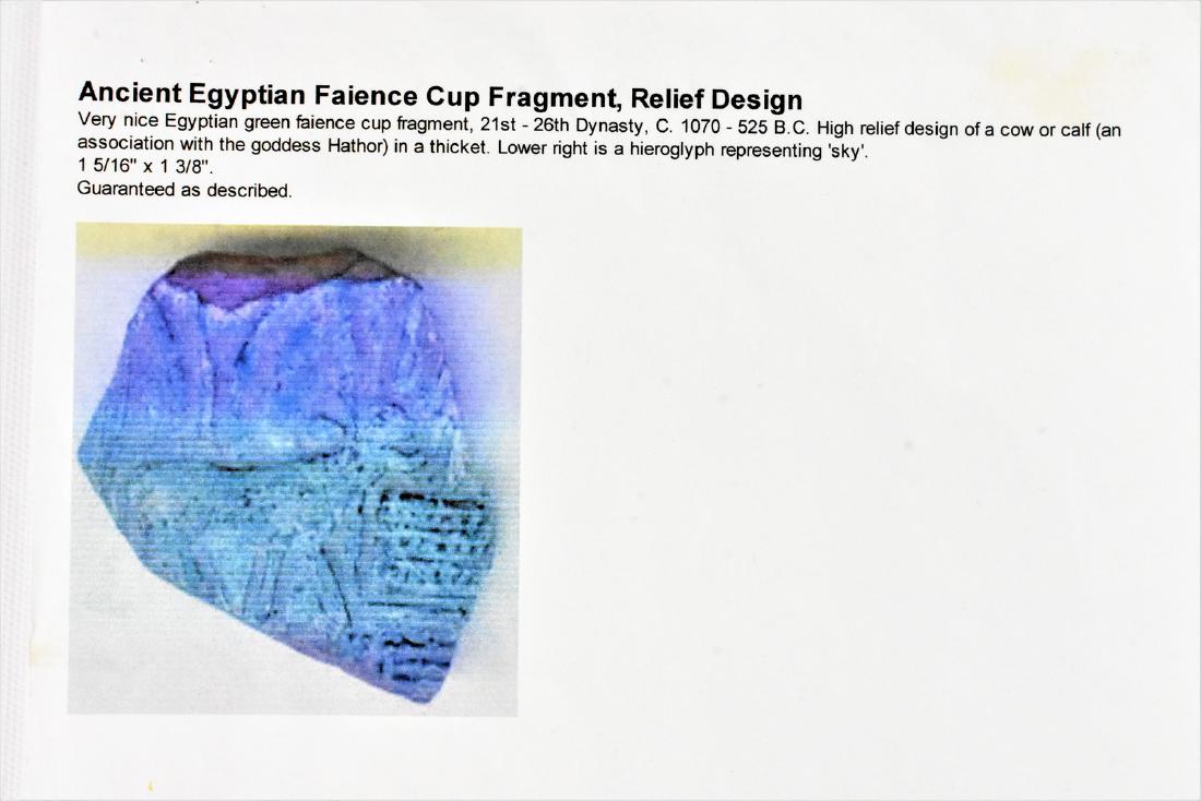Ancient Egyptian Faience Cup Fragment: A very nice Egyptian Green Faience Cup fragment, 21st-26th Dynasty, C. 1070-525 B.C. High relief design of a cow or calf (an association with teh goddess Hathor) in a thicket. Lower right is a hierogl