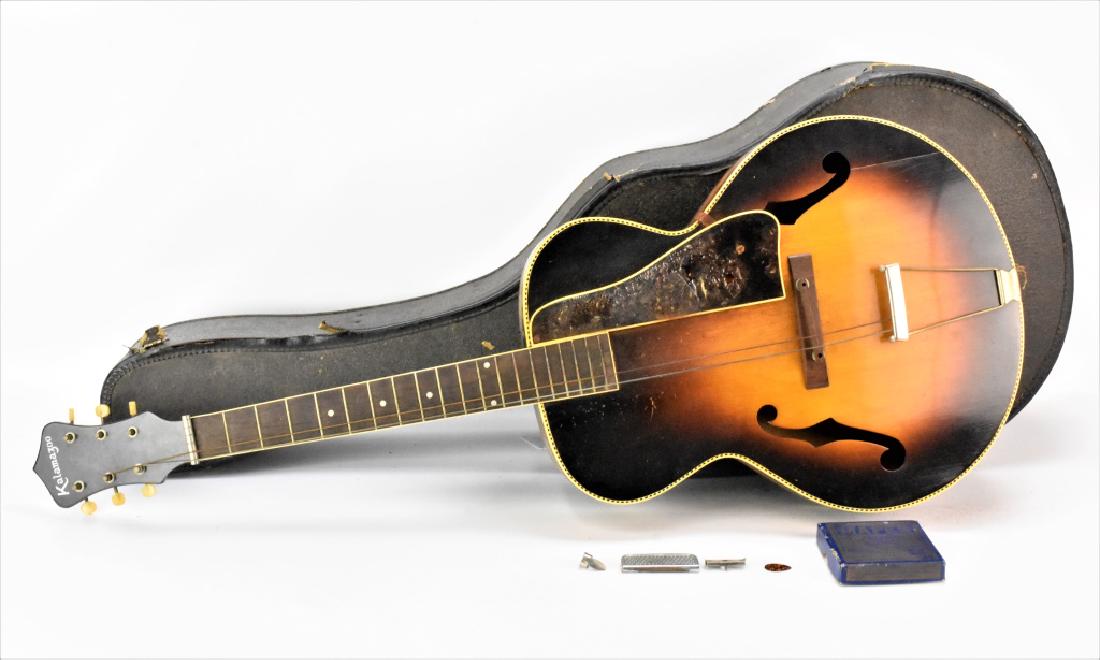 Kalamazoo Gibson Sunburst Guitar: Kalamazoo (Gibson) Guitar, Guitar with case. As found in the estate condition, one seam crack to front, needs replacement scratch guard, overall restorable condition. Circa 1930