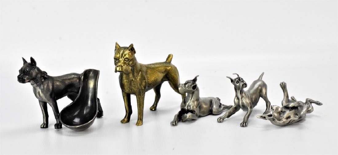 Boxer Sculpture Grouping: Boxer Sculpture Grouping (5), ( with a Pewter or silvered metal finish in the form of 3 playful boxers. 1 Spelter figural pipe holder in the form of a boxer. 1 iron sculpture of a boxer with a gold fi