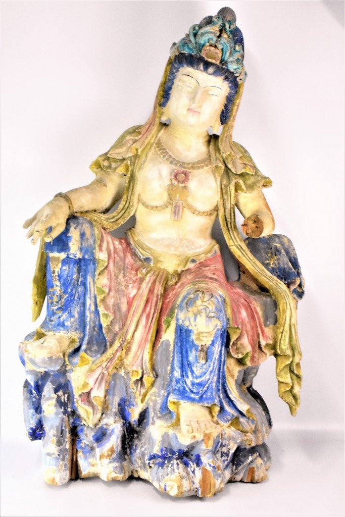 Massive Chinese Carved Temple Figure of Guanyin: Carved and polychrome wood figure of Guanyin. This Guanyin is from China or possibly Nothern India and is in the form of the bodhisattva. 18th / 19th Century Figure has loss to right hand and is witho