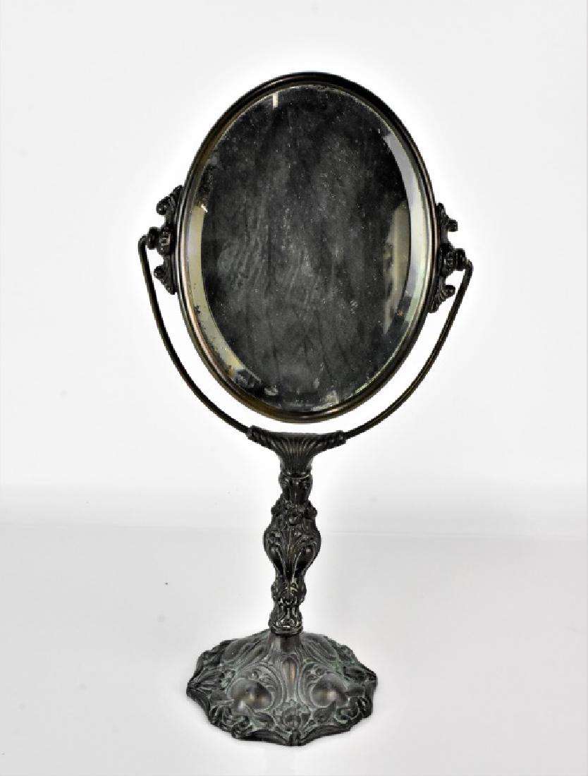 Antique Vanity Mirror: An Antique Vanity Mirror measuring approx. 16.25"h