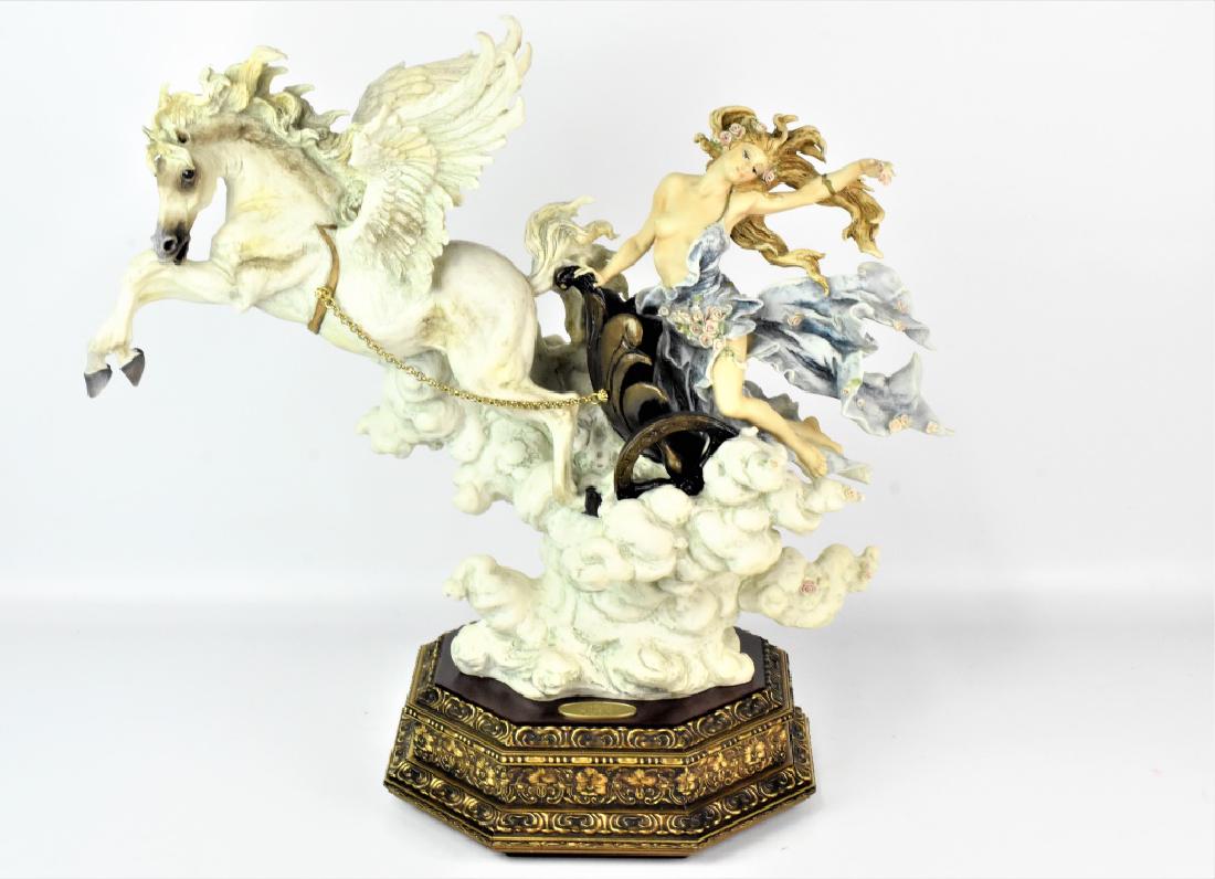 Giuseppe Armani 'Aurora' Porcelain Figure: Giuseppe Armani 'Aurora' porcelain figure #0680-C. Depicts a nude woman in chariot being pulled by a winged horse. Numbered 105/1500. Signed to front and Capodimonte crown mark to back of porcelain ba