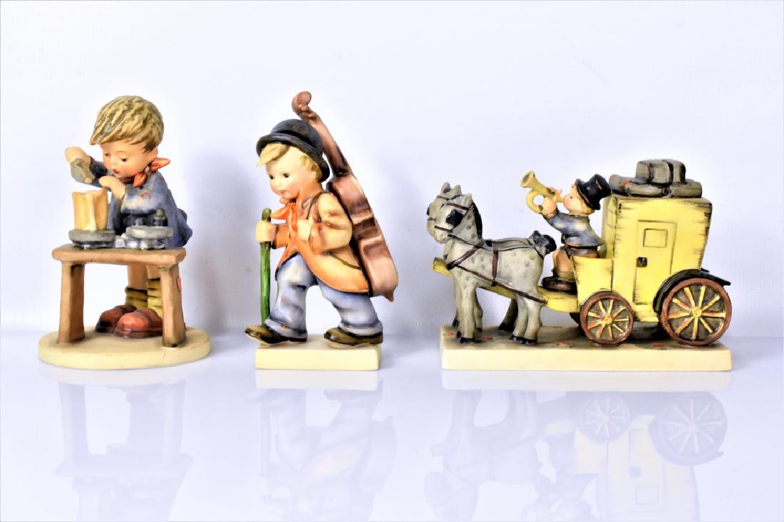 Hummel & Goebel Figurines Grouping: Grouping includes (3) Goebel Hummels, including "A Fair Measure" #345 1972, "Little Cellist" #89/1, and "The Mail is Here" #226