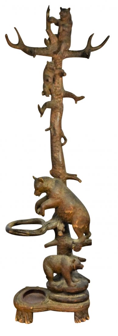 German Carved Black Forest Hall Tree: Exceptional black forest carved hall tree. Nicely carved In the form of a bear and three cubs climbing a tree. All original finish circa 1890 to 1900. Disassembles for transport