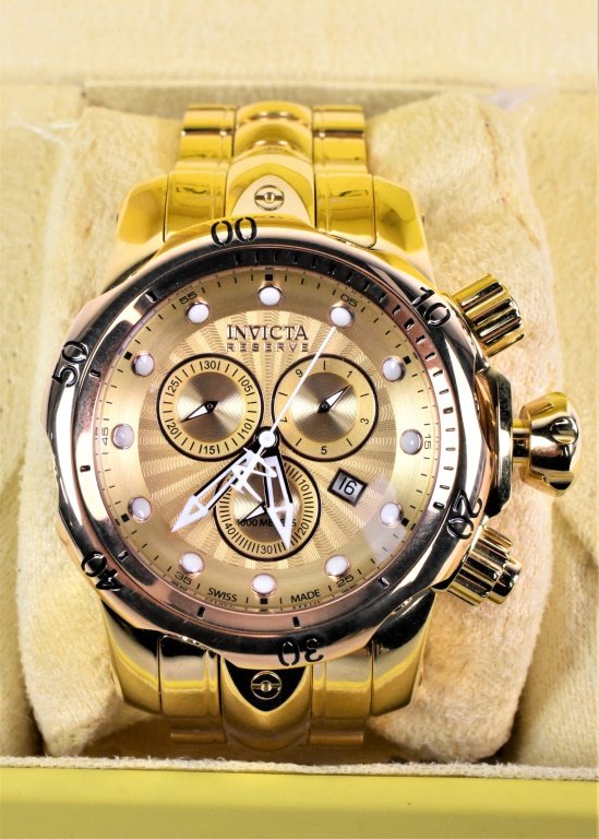 Invicta Venom Boy's Watch: Invicta Venom Boy's Watch model #13895 Swiss components with a stainless steel band 46mm case size 100m water resistance. Includes case and instruction manual. Provenance: private collection, some "ne