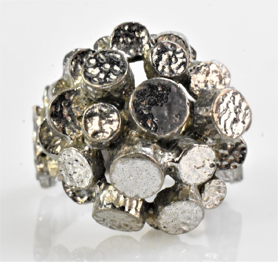Mid-Century Modern Sterling Silver Brutalist Ring: A fine modernist sterling silver ring hallmarked AG or AC. We attribute this to be a piece of Andrew Grima (British, 1921-2007) sterling silver jewelry. He was an Anglo-Italian designer who became kno