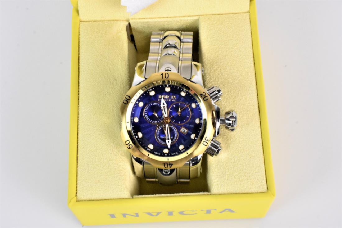 Invicta Reserve Boy's Watch: Invicta Reserve Boy's Watch model #10798 Swiss components with a stainless steel band 46mm case size made of stainless steel and 14K yellow gold 100m water resistance. Includes case and instructional