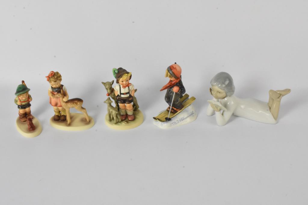Hummel Figurine Grouping: Includes (4) Hummels (Goebel figurines) (1947 136-7, 1943 200-1, 6 2/0, 1959) and (1) Porcelain figure made in Spain in the manner of a Lladro, Largest measures approx. 5.5"h