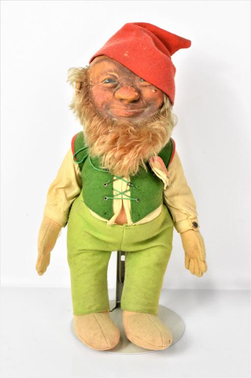 Steiff Lucki Doll: Steiff Lucki Doll measuring approx. 11.25"h. Comes with original Steiff tag and button on sleeve.