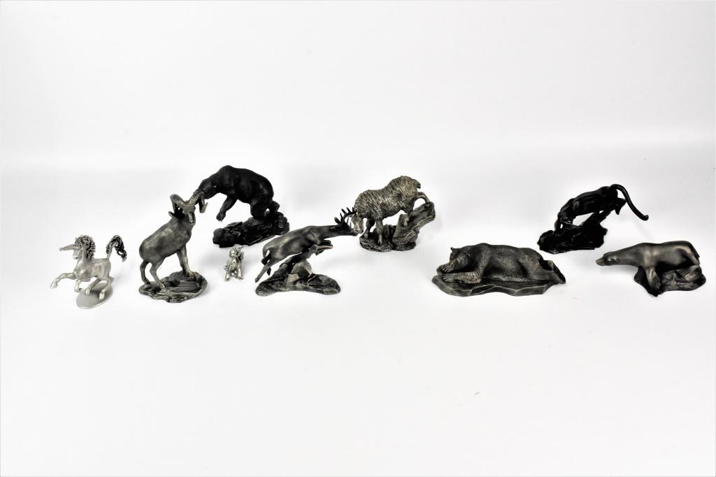 Franklin Mint Pewter Sculpture Grouping: Grouping includes (9) pieces; (7) Fine Pewter Franklin Mint pieces including 'The Grizzly Bear,' 'The Mountain Goat,' 'The White-Tailed Deer,' 'The Bighhorn Sheep,' 'The Polar Bear,' The Sea Lion,' an