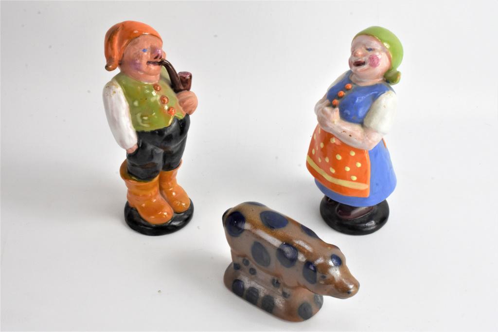Redware figure Grouping: marked J.Lipp redware figural grouping. both figured are signed J. Lipp. woman and chip to rear edge.lot also comes with a blue decorated stoneware pig