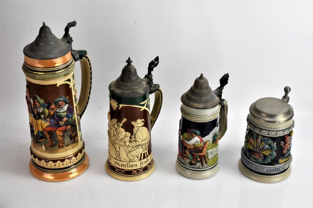 AJ Thewalt Stein German Beer Stein Grouping: Albert Jacob Thewalt Steins grouping of 4, 2 antique and good condition marked with the AT with a dot above the T, one numbered 51, anther says Germany 545. 2 slighly more contemporar marked with the 