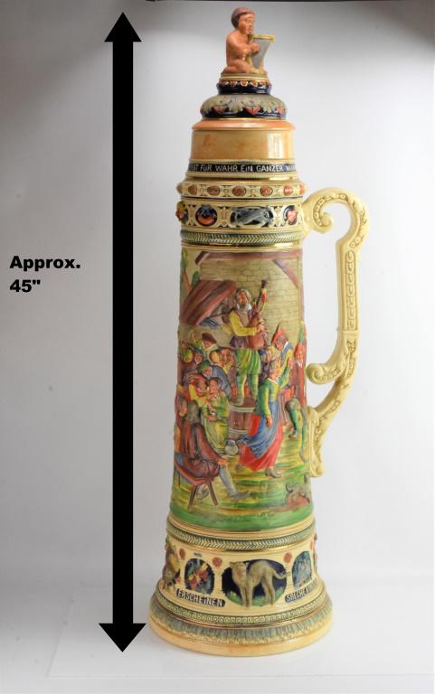 Antique Gerz Wedding Beer Stein: A two-piece stein measuring approx. 45"h. Inscribed on top "Wer diesen humpen leeren kann. Ist fur wahr ein ganzer mann." Also marked on base "Solche kunden, Nach froh ver, Lebten Stunden, Erscheinen"