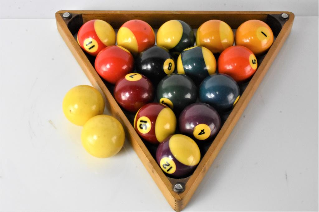 Vintage Billiard Pool Ball Grouping: Grouping includes (17) vintage billiard pool balls including (2) cue balls, (7) solid colored balls, (7) striped balls, and (1) solid colored 8 ball. Also includes the ball rack.