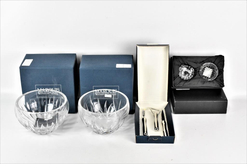 Waterford Crystal Grouping: Grouping includes (5) pieces; a Wyndmere 7"l Bowl, an Ariel 7"l Bowl, and (2) Wateford Crystal WS Keepsake Boxes with contents (votives and glass containter with lid). Both bowls are in original boxes