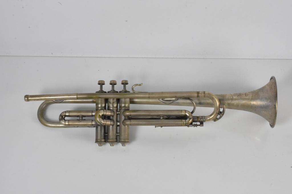 Supertone Bandmaster Trumpet: This is a nice example of a Supertone Bandmaster trumpet made in Elkhart. It is old, and is in aged condition, but had a nice engraving and is believed to be from the early 20th century circa (1900-19