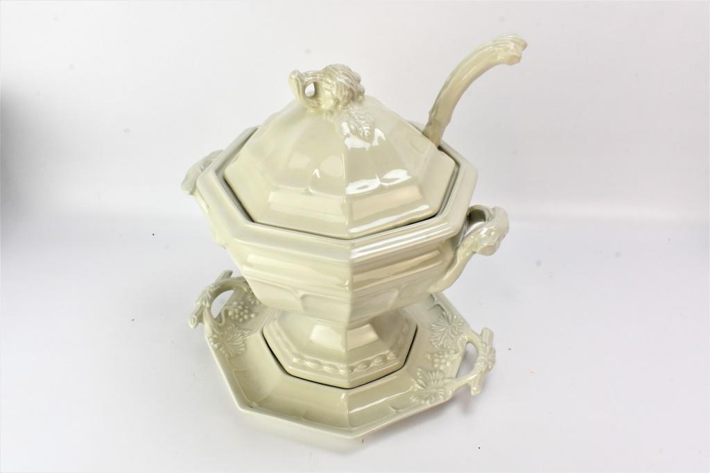 Vintage White Ironstone Soup Tureen: This beautiful vintage Ironstone Soup Tureen is marked underneath with "Red cliff, Ironstone" which dates this piece to C. 1960. The very decorative white tureen features a grape pattern and comprises