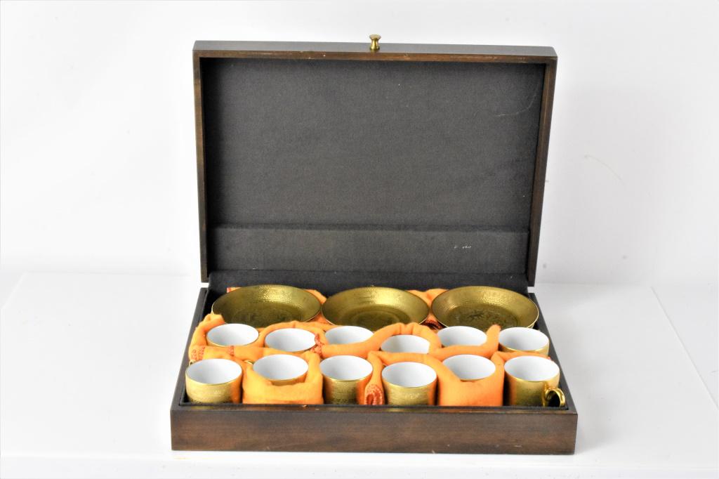 Bavarian Cup and Saucer Grouping: Grouping includes (24) Aofi Bavarian porzellan 'Atzdekor echt Gold' pieces, including (12) cups and (12) saucers. Includes wood case.