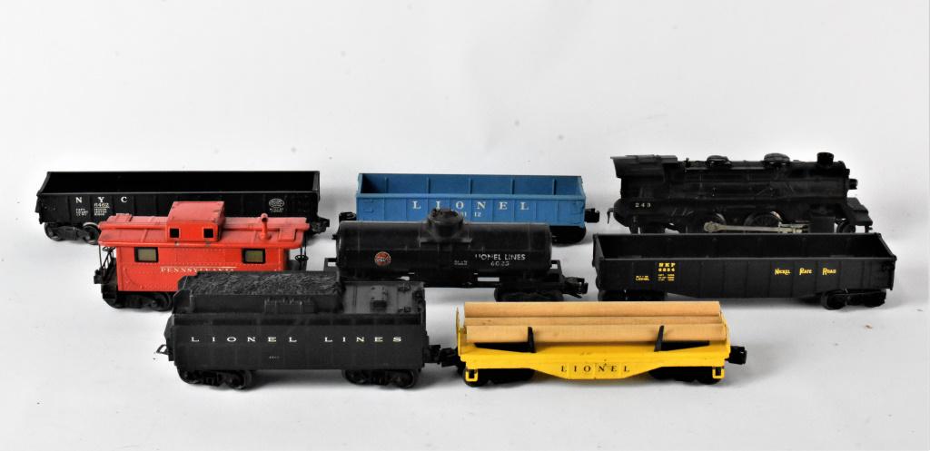 Lionel Box Car Train Grouping: Grouping includes (8) pieces including models #243, #6254, #6462, #243W, #6112, #6025, #2457, and a Lionel log carrier. No original boxes included.