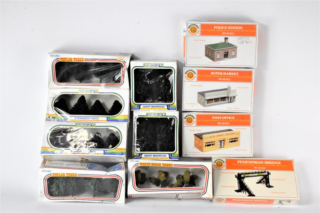 Plasticville Train Accessory Grouping: Grouping includes (11) pieces including Plasticville models #2645, #2641, #2672, and #2644. Also includes (7) Life-Like pieces including (2) models #1003, #01004, (2) #01005, and (2) #01013. All inclu