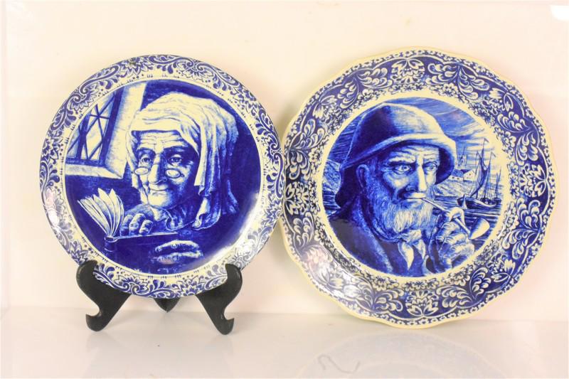 Delft Blue Boch Freres Charger Grouping: Grouping includes (2) pieces; a Delft blue Boch Freres La Louviere Belgium Fisherman plate measuring approx. 13.5" in diameter and a Delft blue Boch Freres La Louviere Belgium of an old woman reading