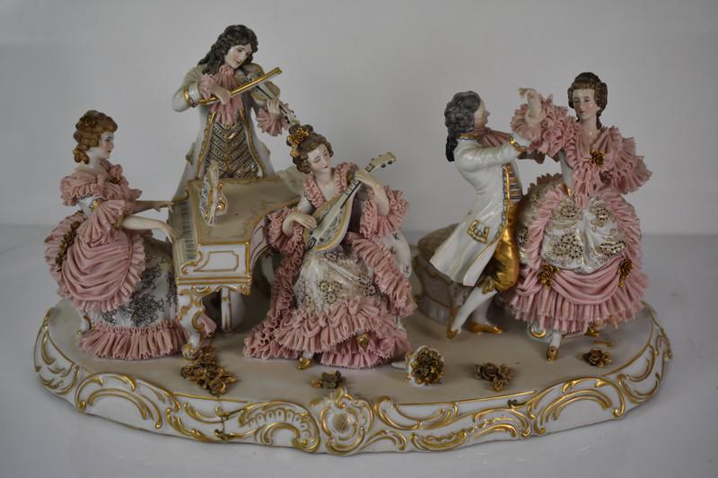 Antique Volkstedt Porcelain Grouping: A fine large porcelain grouping in the manor of Meissen or Dresden, but most likely Volkstedt. As found in the estate with loss and old repair to base. Measures approx. 17"l