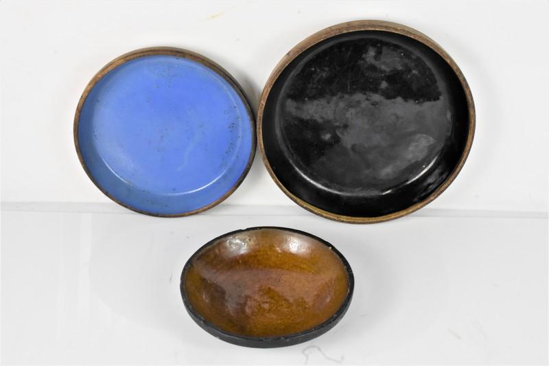 Older Stoneware Plate Grouping: Grouping of (3) Stoneware Dishes including (1)Black Glazed Star Pie Plate measuring approx. 10" in diameter marked "Star Fire-Clay Acid-Proof" on bottom.(1)Blue Glazed Ideal Pie Plate measuring approx