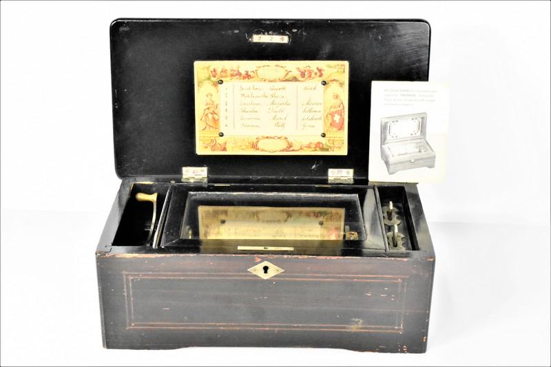 Antique Thorens Rosewood Music Box Six Tune: Antique Thorens Rosewood Finished Single Comb Music Box. Plays 6 tunes and 4 7/8in Cylinder. Swiss works