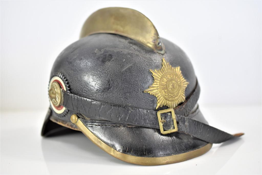 Prussian Imperial Firemans Helmet: Prussian Imperial Firemans Helmet. has Minor loss to leather exterior, and the ridge is not firm. The leather chin strap and liner is in good condition and has all the original parts. The wappen (cres