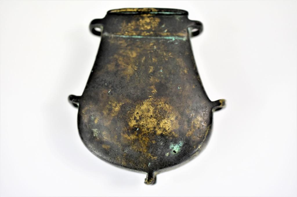 Early to Mid 19th century Islamic Cartridge Pouch: Early to Mid 19th century Islamic Brass Cartridge Pouch. In excellent condition for its age. It does have worn islamic designs. has metal balls on the inside measures: appx. 3" tall Provenance from an