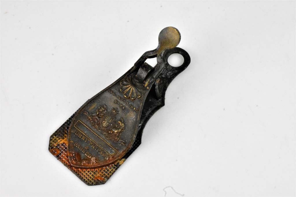 Primitive Cast Iron Match Holder Grouping: Primitive Cast Iron Match Holder Grouping including (1) Unmarked Metal Bird & Stump with Wooden Inset at Bottom, Antique Brass Letter Clip marked "Merry, Phipson & Parkers Letter Clip Reg Octr 3 1845 