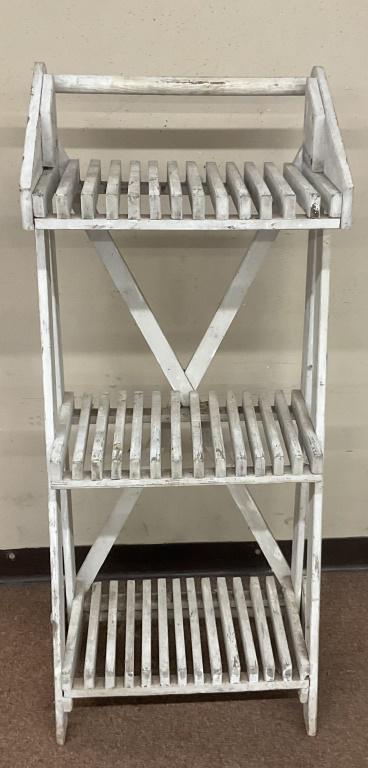 Vintage Garden Cart on Wheels: Three shelf rolling garden cart made of wood in old white paint, very cool piece. Very sturdy. Rolls easily. Approximately 50 inches tall and 20 inches wide.