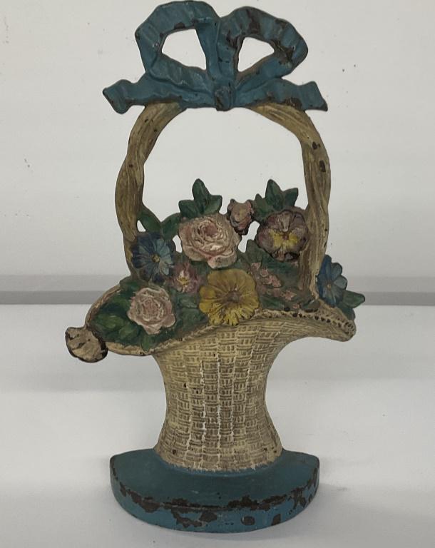 Cast Iron Door Stop: Cast iron Basketflower motif approximately 11 inches tall